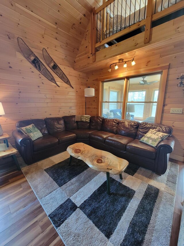 12 Jl Dr, Eustis, ME 04936 - living area with wood finished floors, wood walls, and high vaulted ceiling