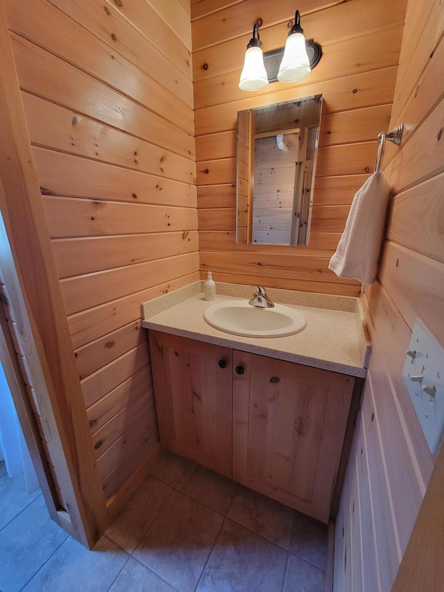 12 Jl Dr, Eustis, ME 04936 - bathroom with vanity, wooden walls, and tile patterned floors