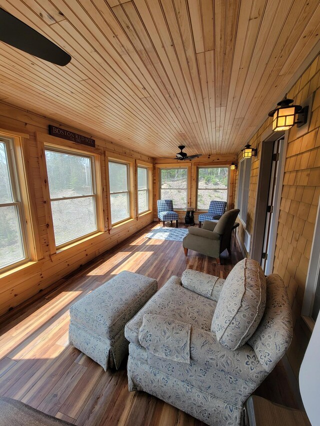 12 Jl Dr, Eustis, ME 04936 - sunroom / solarium with wood finished floors, wood ceiling, plenty of natural light, and wooden walls