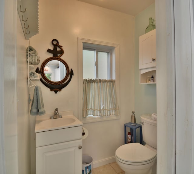 12B Trues Point Rd, New Gloucester, ME 04260 - bathroom featuring vanity, toilet, baseboards, and tile patterned flooring