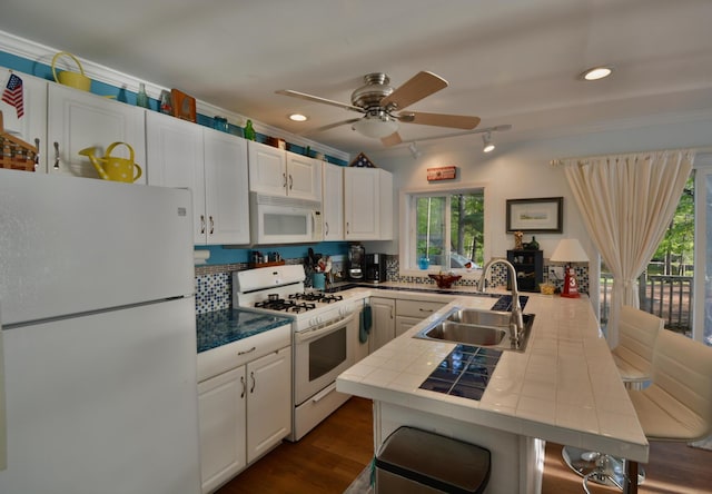 12B Trues Point Rd, New Gloucester, ME 04260 - kitchen with white appliances, a sink, tile countertops, a ceiling fan, and plenty of natural light
