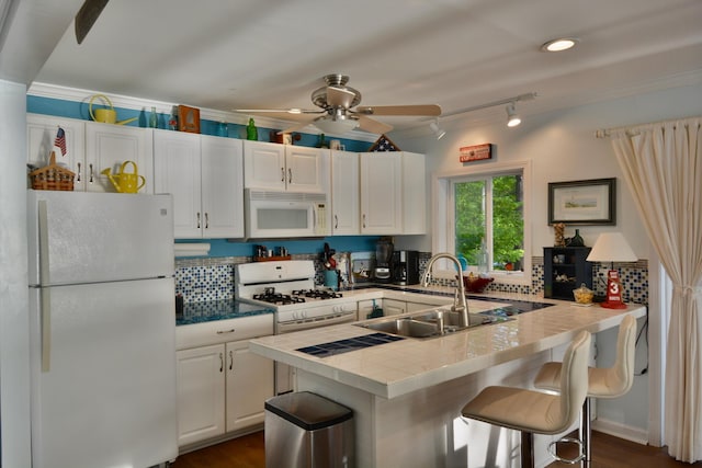 12B Trues Point Rd, New Gloucester, ME 04260 - kitchen with white appliances, a sink, white cabinetry, crown molding, and a ceiling fan