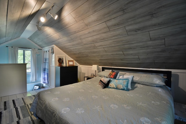 12B Trues Point Rd, New Gloucester, ME 04260 - bedroom with rail lighting and lofted ceiling