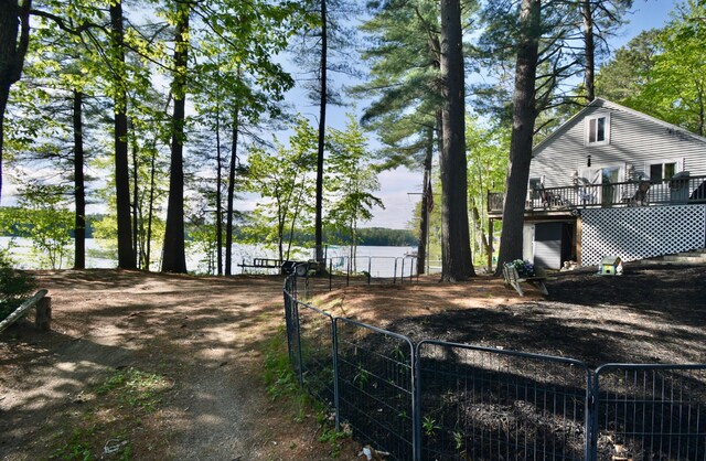 12B Trues Point Rd, New Gloucester, ME 04260 - view of yard featuring a deck with water view