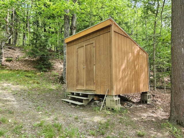 75 Snow Goose Ln, Dexter, ME 04930 - view of shed featuring a wooded view