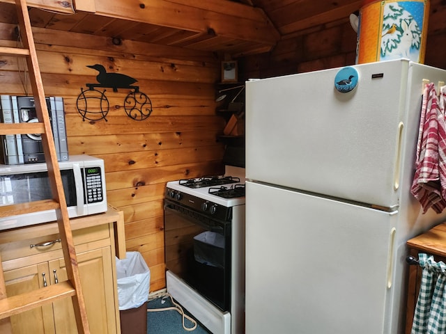 75 Snow Goose Ln, Dexter, ME 04930 - kitchen with white appliances, wood ceiling, and wooden walls