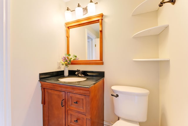 99 Silver St Unit 3-10, Portland, ME 04101 - half bathroom with toilet and vanity