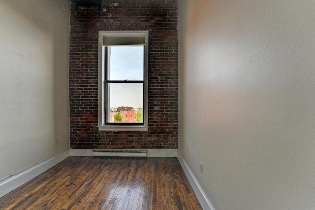 99 Silver St Unit 3-10, Portland, ME 04101 - empty room with hardwood / wood-style flooring, plenty of natural light, and baseboards