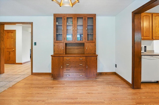 473 Davenport Hill Rd, Jay, ME 04239 - unfurnished dining area featuring baseboards and light wood finished floors