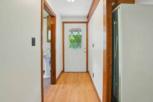 473 Davenport Hill Rd, Jay, ME 04239 - entryway with light wood-style floors and baseboards