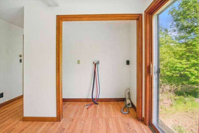 473 Davenport Hill Rd, Jay, ME 04239 - interior space with washer hookup, light wood-style flooring, and baseboards