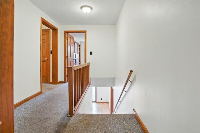 473 Davenport Hill Rd, Jay, ME 04239 - hall featuring an upstairs landing, carpet floors, and baseboards