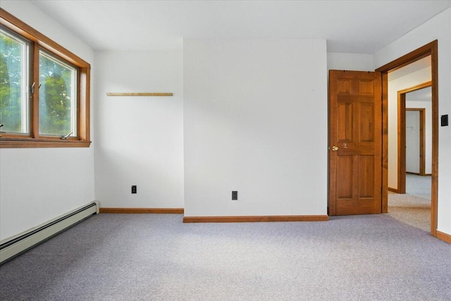 473 Davenport Hill Rd, Jay, ME 04239 - spare room featuring a baseboard radiator, carpet flooring, and baseboards