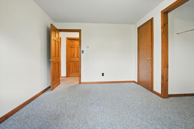 473 Davenport Hill Rd, Jay, ME 04239 - unfurnished bedroom featuring light colored carpet and baseboards