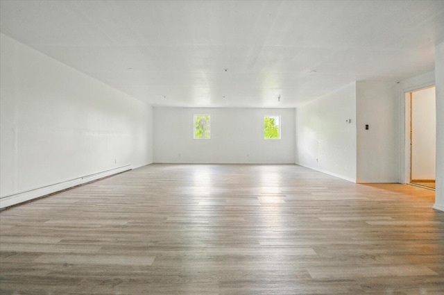 473 Davenport Hill Rd, Jay, ME 04239 - spare room featuring wood finished floors, baseboard heating, and baseboards
