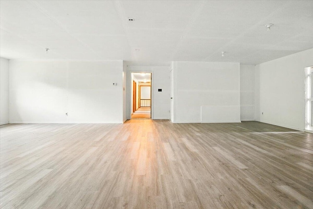 473 Davenport Hill Rd, Jay, ME 04239 - unfurnished living room featuring light wood-style flooring and baseboards