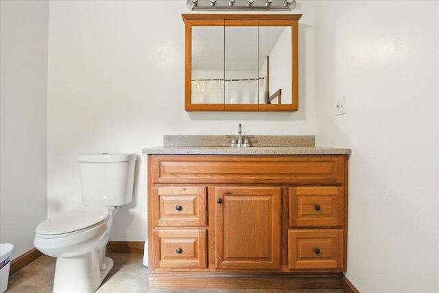 473 Davenport Hill Rd, Jay, ME 04239 - full bathroom featuring toilet, vanity, and baseboards