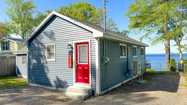 1491 Richville Rd, Standish, ME 04084 - view of front of house with entry steps, a water view, and ac unit