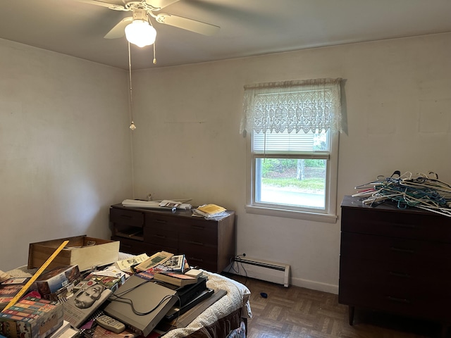 114 Summit Ave, Farmington, ME 04938 - bedroom with a baseboard radiator, a ceiling fan, and baseboards