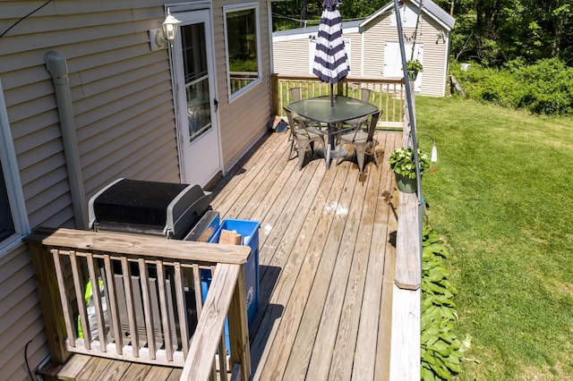 1007 Old Stage Rd, Woolwich, ME 04579 - wooden terrace with a yard, outdoor dining area, and an outdoor structure