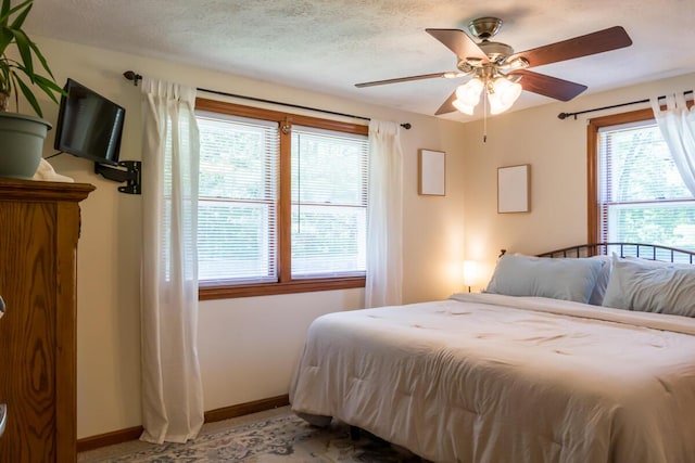 1007 Old Stage Rd, Woolwich, ME 04579 - bedroom with baseboards and a ceiling fan