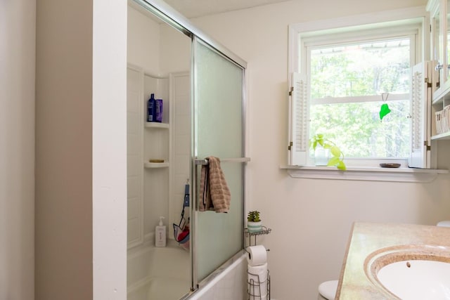 1007 Old Stage Rd, Woolwich, ME 04579 - full bath featuring vanity, toilet, and shower / bath combination with glass door