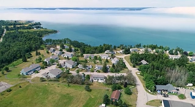 27 Misty Harbor Ln Unit 210, Cutler, ME 04626 - aerial view of property's location featuring a large body of water and nearby suburban area
