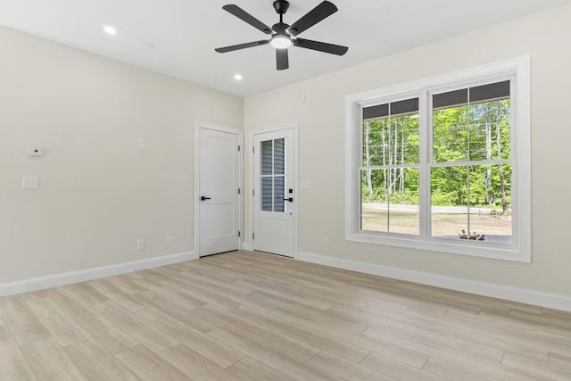 25 Sarah Vaughn Rd, Hollis, ME 04042 - unfurnished room featuring baseboards, light wood-style flooring, a ceiling fan, and recessed lighting