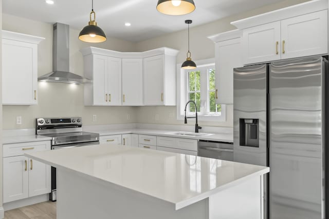 25 Sarah Vaughn Rd, Hollis, ME 04042 - kitchen featuring wall chimney exhaust hood, appliances with stainless steel finishes, a sink, light countertops, and white cabinets