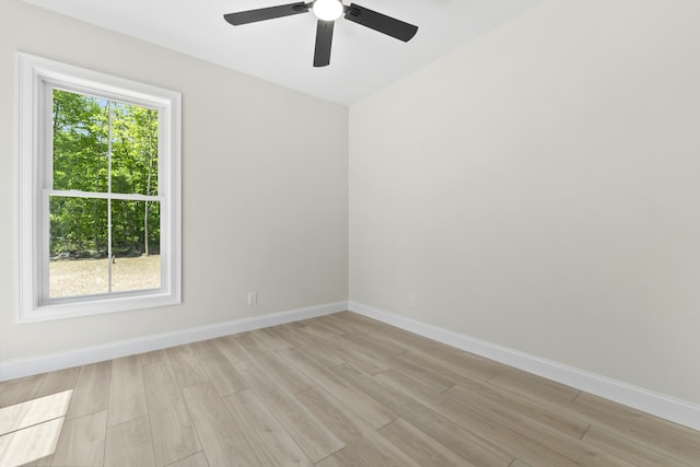 25 Sarah Vaughn Rd, Hollis, ME 04042 - unfurnished room with light wood-style flooring, ceiling fan, and baseboards