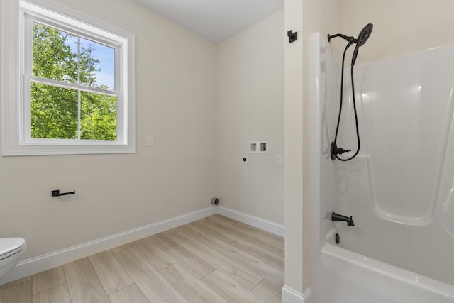 25 Sarah Vaughn Rd, Hollis, ME 04042 - full bathroom featuring baseboards, toilet, tub / shower combination, and wood finished floors