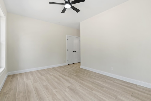 25 Sarah Vaughn Rd, Hollis, ME 04042 - empty room featuring a ceiling fan, light wood-style flooring, and baseboards