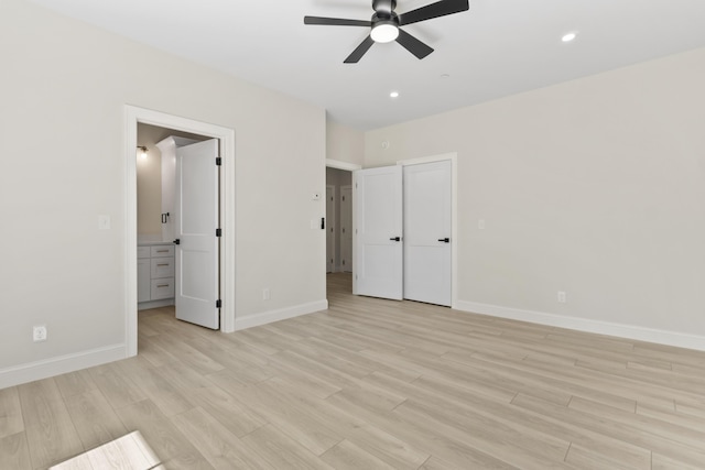 25 Sarah Vaughn Rd, Hollis, ME 04042 - unfurnished bedroom with light wood-type flooring, baseboards, recessed lighting, and ensuite bathroom