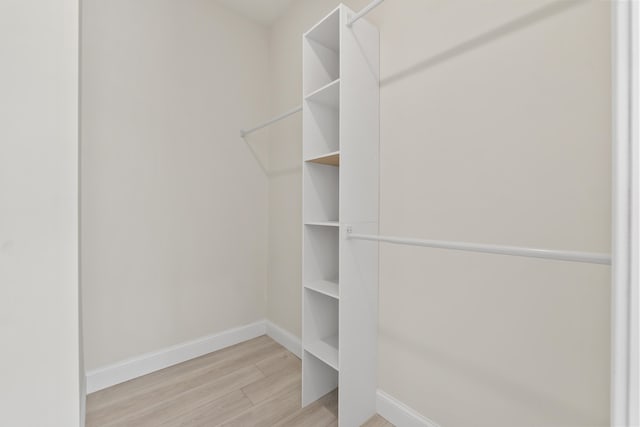 25 Sarah Vaughn Rd, Hollis, ME 04042 - walk in closet featuring wood finished floors