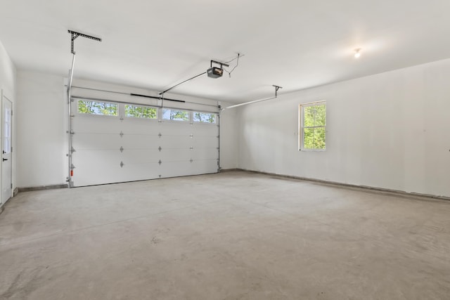 25 Sarah Vaughn Rd, Hollis, ME 04042 - garage featuring a garage door opener
