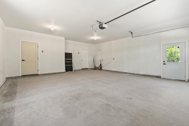 25 Sarah Vaughn Rd, Hollis, ME 04042 - garage with a garage door opener