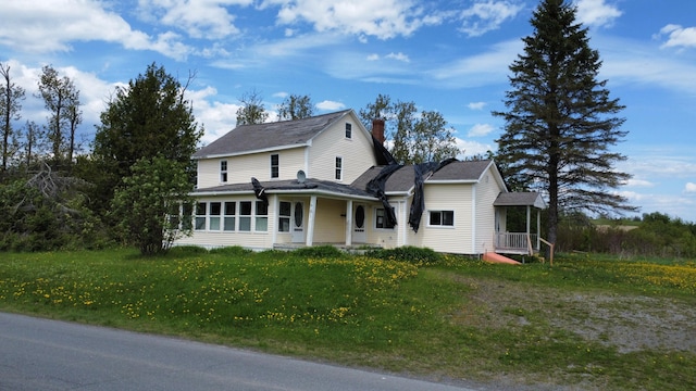 61 Brook Rd, Saint Agatha, ME 04772 - farmhouse with a chimney and a front lawn