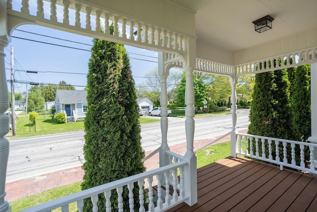 205 Beach St, Saco, ME 04072 - wooden porch with a lawn