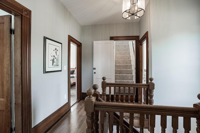 205 Beach St, Saco, ME 04072 - foyer with wood-type flooring, a chandelier, and baseboards