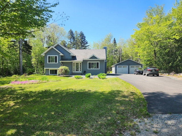 34 Sandy Acres Dr, Sullivan, ME 04664 - tri-level home with an outdoor structure, a garage, french doors, and a front yard
