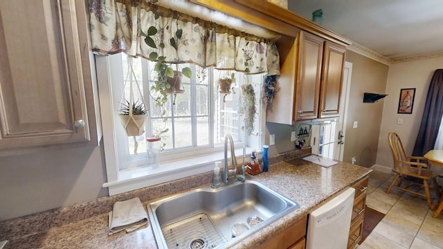 34 Sandy Acres Dr, Sullivan, ME 04664 - kitchen featuring white dishwasher, brown cabinets, light stone countertops, and tile patterned floors