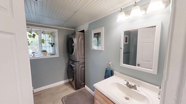 34 Sandy Acres Dr, Sullivan, ME 04664 - bathroom with stacked washer / drying machine and vanity
