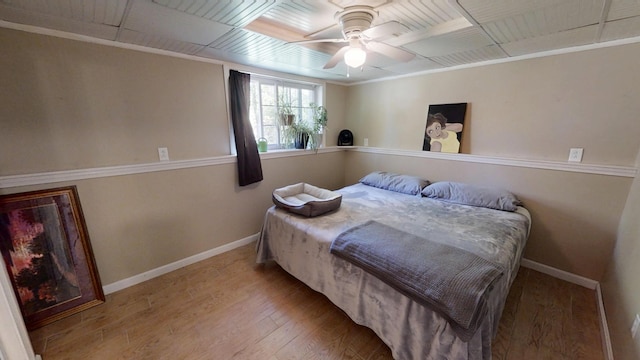 34 Sandy Acres Dr, Sullivan, ME 04664 - bedroom with wood finished floors, ceiling fan, and crown molding