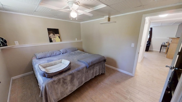 34 Sandy Acres Dr, Sullivan, ME 04664 - bedroom with light wood-style floors, crown molding, and a ceiling fan