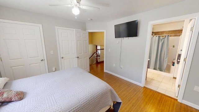 34 Sandy Acres Dr, Sullivan, ME 04664 - bedroom featuring wood finished floors, connected bathroom, and ceiling fan