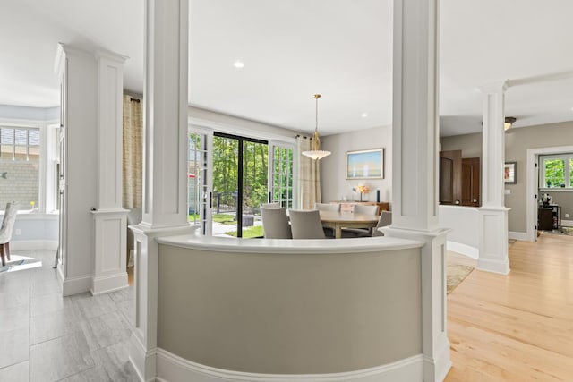 38 Darcy Rd, York, ME 03909 - living area with decorative columns, baseboards, recessed lighting, and light wood-style flooring