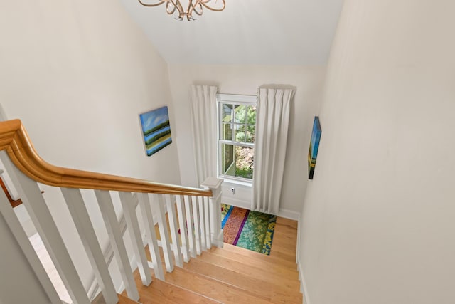 38 Darcy Rd, York, ME 03909 - stairway with wood finished floors, baseboards, and a chandelier