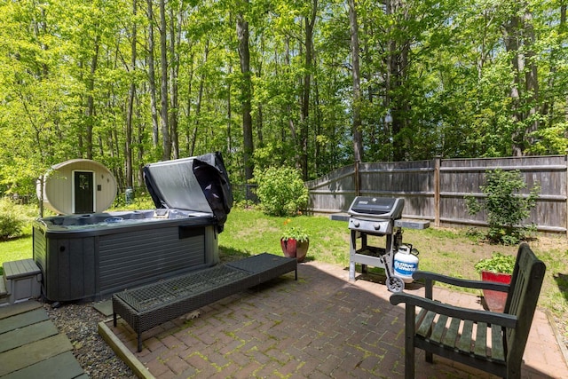38 Darcy Rd, York, ME 03909 - fenced backyard with a hot tub, a patio area, and grilling area