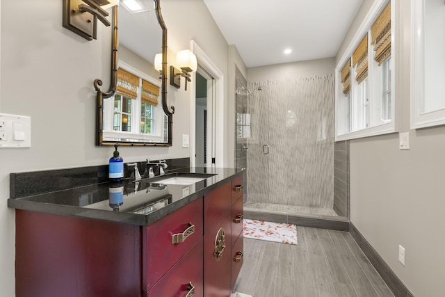 38 Darcy Rd, York, ME 03909 - full bath with a shower stall, vanity, baseboards, wood finished floors, and recessed lighting