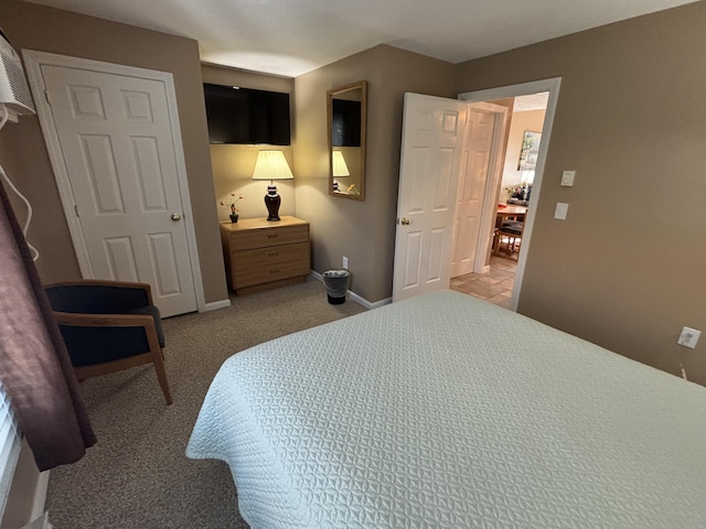 1351 Post Rd Unit 49, Wells, ME 04090 - bedroom featuring baseboards and carpet floors